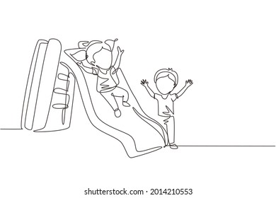 Single one line drawing preschool kids playing together in kindergarten. Little girl sliding down the slide and smiling boy seeing her on side of slide. Continuous line draw design graphic vector