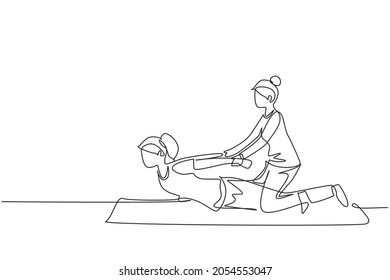 Single one line drawing professional therapist practicing massage therapy. Woman patient enjoying wellness spa body treatment. Rehabilitation, physiotherapy. Continuous line draw design graphic vector