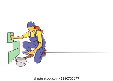 Trabajador de reparación de planos de una sola línea colocando baldosas de cerámica. Tiler profesional en trabajo uniforme. Reparadora en overoles de baldosas en casa. Ilustración gráfica de diseño de trazos de línea continua