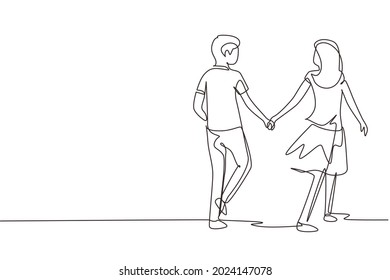 Single one line drawing romantic young couple in love hand in hand. Couple in love spending time together at park. Happy family concept. Modern continuous line draw design graphic vector illustration