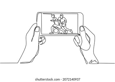 Single one line drawing soccer football league live streaming mobile phone  Man hands holding smartphone   watch any live football match online  Continuous line draw design vector illustration