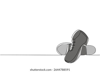Single one line drawing tap dance shoes with a metal plate on the bottom. Shoes of men specifically for dancing. Made of leather. National Tap Dance Day. Continuous line design graphic illustration