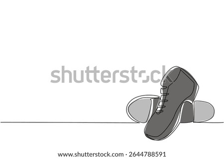 Single one line drawing tap dance shoes with a metal plate on the bottom. Shoes of men specifically for dancing. Made of leather. National Tap Dance Day. Continuous line design graphic illustration
