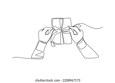 Single one line drawing top of view hand wrapping the gift. Giving season go concept. Continuous line draw design graphic vector illustration.