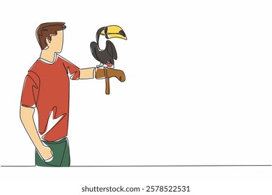 Single one line drawing toucan bird perched on hand of man. The most attractive bird in the zoo. Long orange beak. Not good at flying. Man Holding Bird. Continuous line design graphic illustration