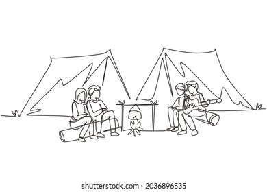 Single one line drawing two pair man woman hikers sitting on log cooking water in boiling pot. Guy playing guitar and sing with friends at campfire near camp tent. Continuous line draw design vector