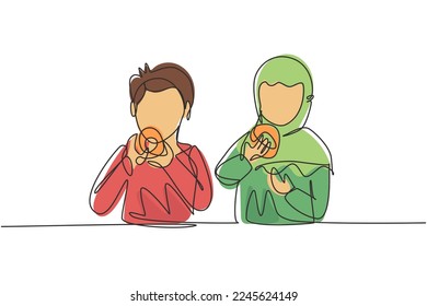Single one line drawing two Arabian boy and girl having donuts meal with hand around table. Enjoy breakfast at home. Tasty and healthy food. Continuous line draw design graphic vector illustration