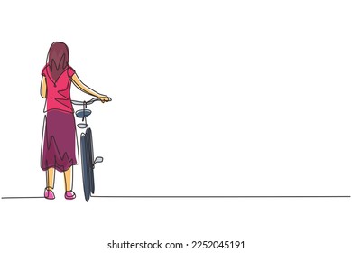 Single one line drawing walking young lady with bicycles. Happy girl take walk with bicycle at rural road. Healthy lifestyle of village people. Continuous line draw design graphic vector illustration