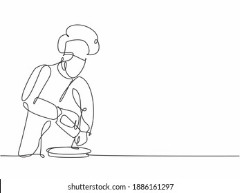 Single one line drawing of young happy male chef sparkling salt and pepper into beef steak on grill pan at commercial kitchen. Modern template one line hand drawn vector illustration minimalism style