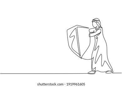 Single one line drawing of young Arabian male entrepreneur holding metal shield to protect from threat. Business resilience minimal concept. Continuous line draw design graphic vector illustration