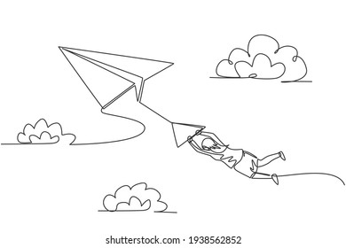 Single one line drawing of young businesswoman hanging on flying paper plane. Business obstacle and challenge. Metaphor minimal concept. Modern continuous line draw design graphic vector illustration