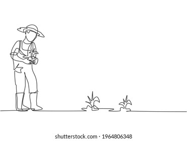 Single one line drawing of young male farmer bring crops to be planted in farm fields. Farming challenge activities minimalist concept. Modern continuous line draw design graphic vector illustration.