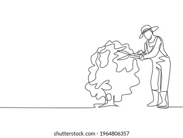 Single one line drawing of young male farmer cut the leaves on the tree using plant scissors. Farming challenge minimalist concept. Modern continuous line draw design graphic vector illustration.