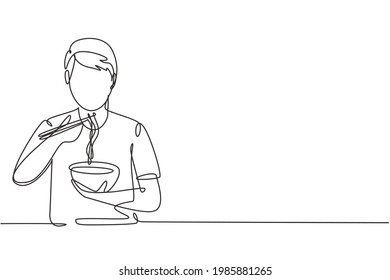 Single one line drawing young male having noodles meal with chopsticks around table. Enjoy lunch when hungry. Delicious and healthy food. Modern continuous line draw design graphic vector illustration