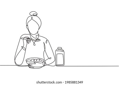 Single one line drawing young woman having cereal meal with milk and spoon. Enjoy breakfast at home. Delicious and healthy food concept. Modern continuous line draw design graphic vector illustration