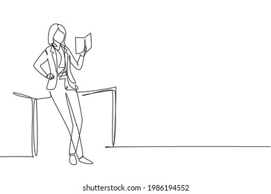 Single one line drawing young woman reading, learning and standing around table. Study in library. Intelligent student, education concept, fair. Continuous line draw design graphic vector illustration