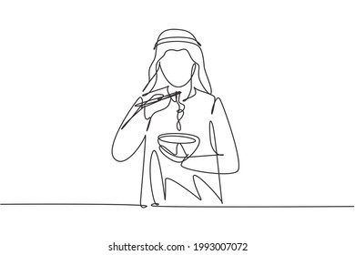 Single one line drawing young Arabian man having noodles meal with chopsticks around table. Enjoy lunch when hungry. Delicious and healthy food. Continuous line draw design graphic vector illustration