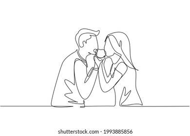 Single one line drawing young beautiful couple sharing apple. Celebrate wedding anniversaries and enjoy romantic lunch at restaurant. Modern continuous line draw design graphic vector illustration