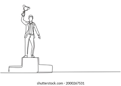 Single one line drawing young businessman wearing suit with tie lifting golden trophy with one hand on podium. Celebrating business performance. Continuous line draw design graphic vector illustration