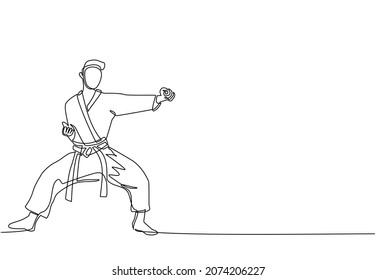 Single one line drawing young talented karateka man train with punch pose for duel fighting at dojo gym center. Mastering martial art sport concept. Modern continuous line draw design graphic vector