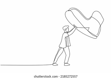 Single one line drawing young businessman against giant shoes stomping. Male manager push against giant foot step. Minimal metaphor concept. Modern continuous line design graphic vector illustration