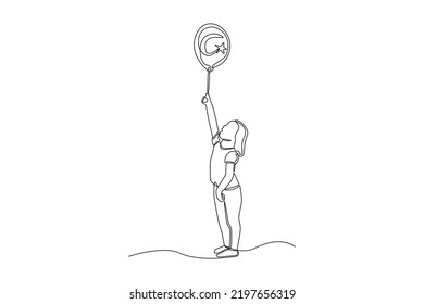 Single one line drawing young girl standing and holding Turkish flag balloon. Turkey Republic day concept. Continuous line draw design graphic vector illustration.