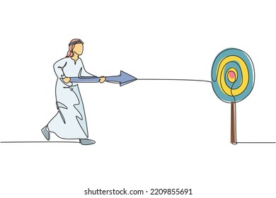 Single one line drawing young attractive Arab male entrepreneur holding arrow spear to hit target. Business focus goal minimal concept. Modern continuous line draw design graphic vector illustration