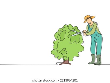 Single one line drawing of young male farmer cut the leaves on the tree using plant scissors. Farming challenge minimalist concept. Modern continuous line draw design graphic vector illustration.