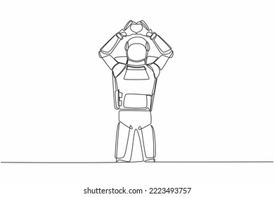 Single one line drawing of young astronaut standing with making love sign or heart symbol with fingers over head. Cosmic galaxy space concept. Modern continuous line graphic design vector illustration