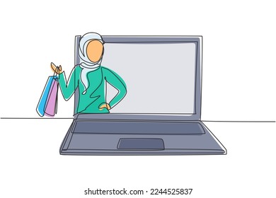 Single one line drawing young Arabian woman coming out of laptop screen holding shopping bags. Digital lifestyle and consumerism concept. Modern continuous line draw design graphic vector illustration