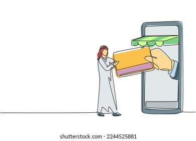Single one line drawing young Arab man inserting credit card into canopy smartphone screen and accepted by hand. Digital payment concept. Modern continuous line draw design graphic vector illustration