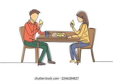 Single one line drawing young couple husband and wife having meal around table. Celebrate wedding anniversary with romantic dinner. Modern continuous line draw design graphic vector illustration