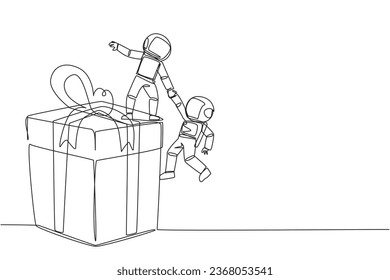 Single one line drawing young astronaut helps colleague climb the big gift box. Integrated teamwork to reach highest level for rewards. Helping each other. Continuous line design graphic illustration