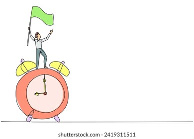 Single one line drawing young businessman standing on giant alarm clock raising flag in the hand. Enjoy business success when the deadline ends. Triumph. Continuous line design graphic illustration