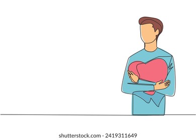 Single one line drawing of young trendy man with casual shirt hugging a red heart symbol in his chest. Illustration of mental health. Self love concept. Continuous line design graphic illustration