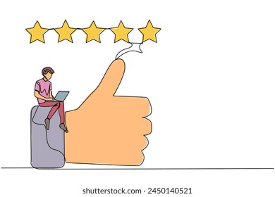 Single one line drawing young smiling man sitting on thumbs up typing on laptop computer. Happy satisfied man giving five gold stars. Online shop review. Continuous line design graphic illustration