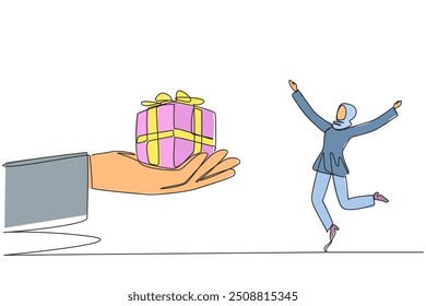 Single one line drawing young Arabian businesswoman excited to get the gift box from the giant hand. Happy surprise. Received many awards. Appropriateness. Continuous line design graphic illustration