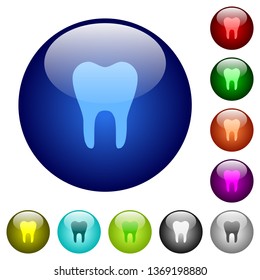 Single tooth icons on round color glass buttons