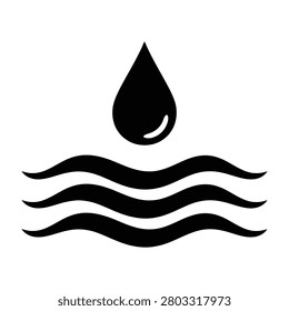 A single water droplet falls into a serene body of water creating ripples