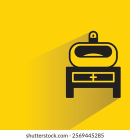 sink icon with shadow on yellow background