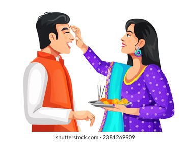 Sister applying tilak on forehead to brother on Bhai Dooj or Raksha Bandhan
