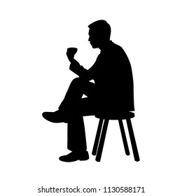 Sitting businessman with coffee cup silhouette vector
