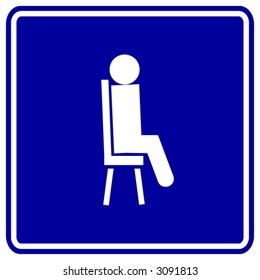 sitting in a chair sign