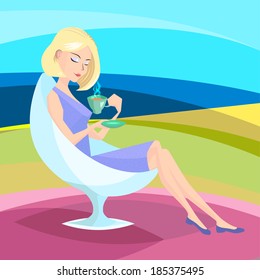 Sitting girl with a cup of coffe