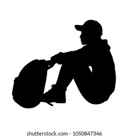 Sitting man with backpack silhouette vector