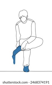 sitting man pulls a sock onto his foot, the second sock is already on - one line art  vector. concept of putting on socks. Handmade vector not AI