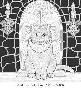 Сat is sitting on the background of the stained glass window in the castle. Coloring book page in the Gothic style with animals.