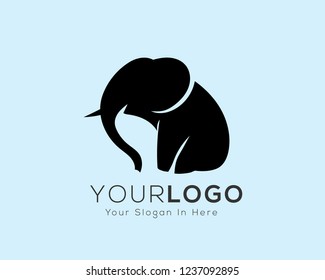 Sitting simple black elephant logo design inspiration