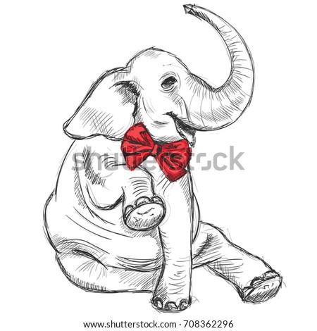 Sitting smiling elephant in a smart red bow.