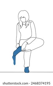 sitting woman pulls a sock onto his foot, the second sock is already on - one line art  vector. concept of putting on socks. Handmade vector not AI